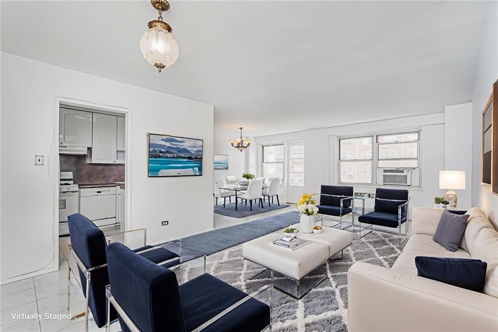 1935 Shore Parkway, Unit 9F Brooklyn, NY 11214 - Photo 1 of 20 a living room with furniture a large window and a table