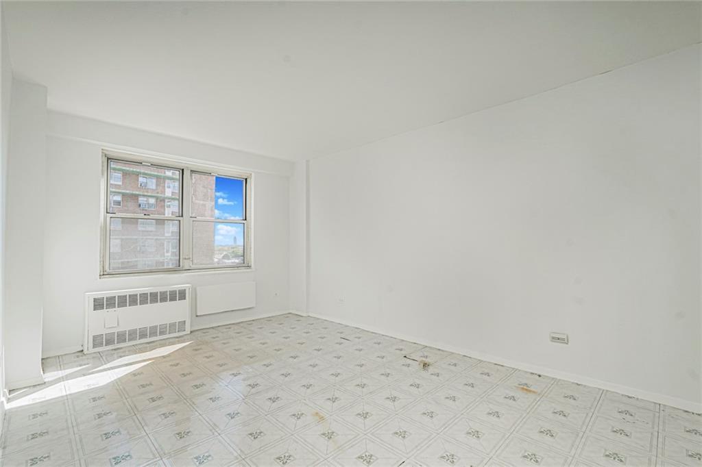 1935 Shore Parkway, Unit 9F Brooklyn, NY 11214 - Photo 15 of 20 an empty room with windows