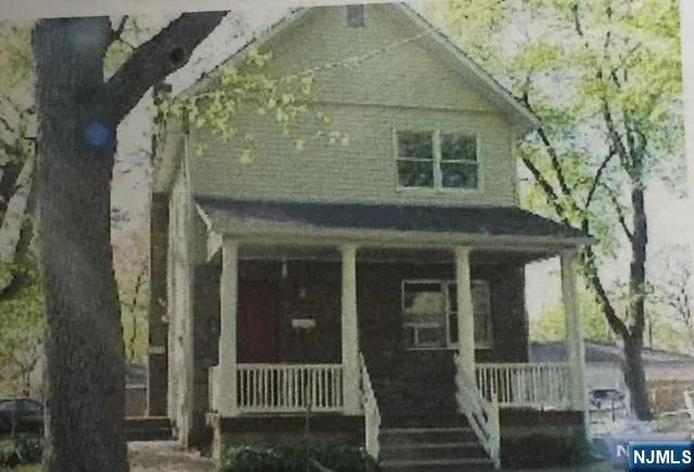 front view of a house with a glass door