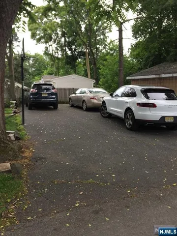 a view of cars parked in a parking lot