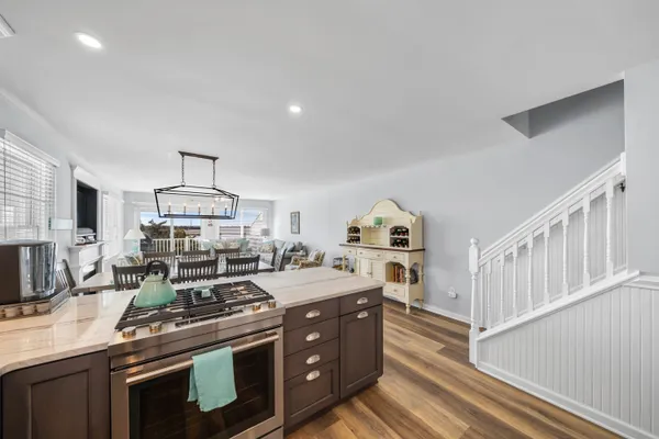 a kitchen with a stove and a sink