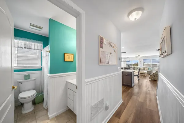 a bathroom with a toilet a sink and a bathtub