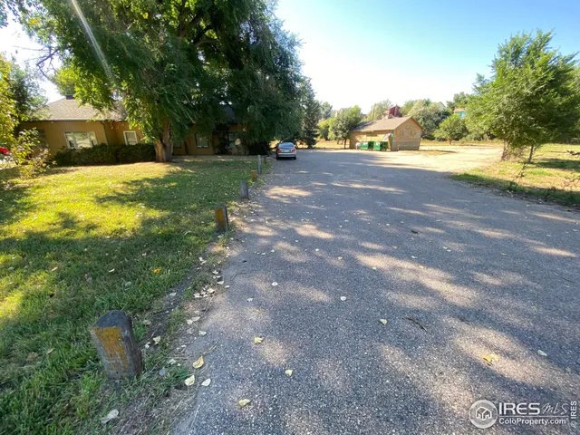 a view of a yard with an outdoor space