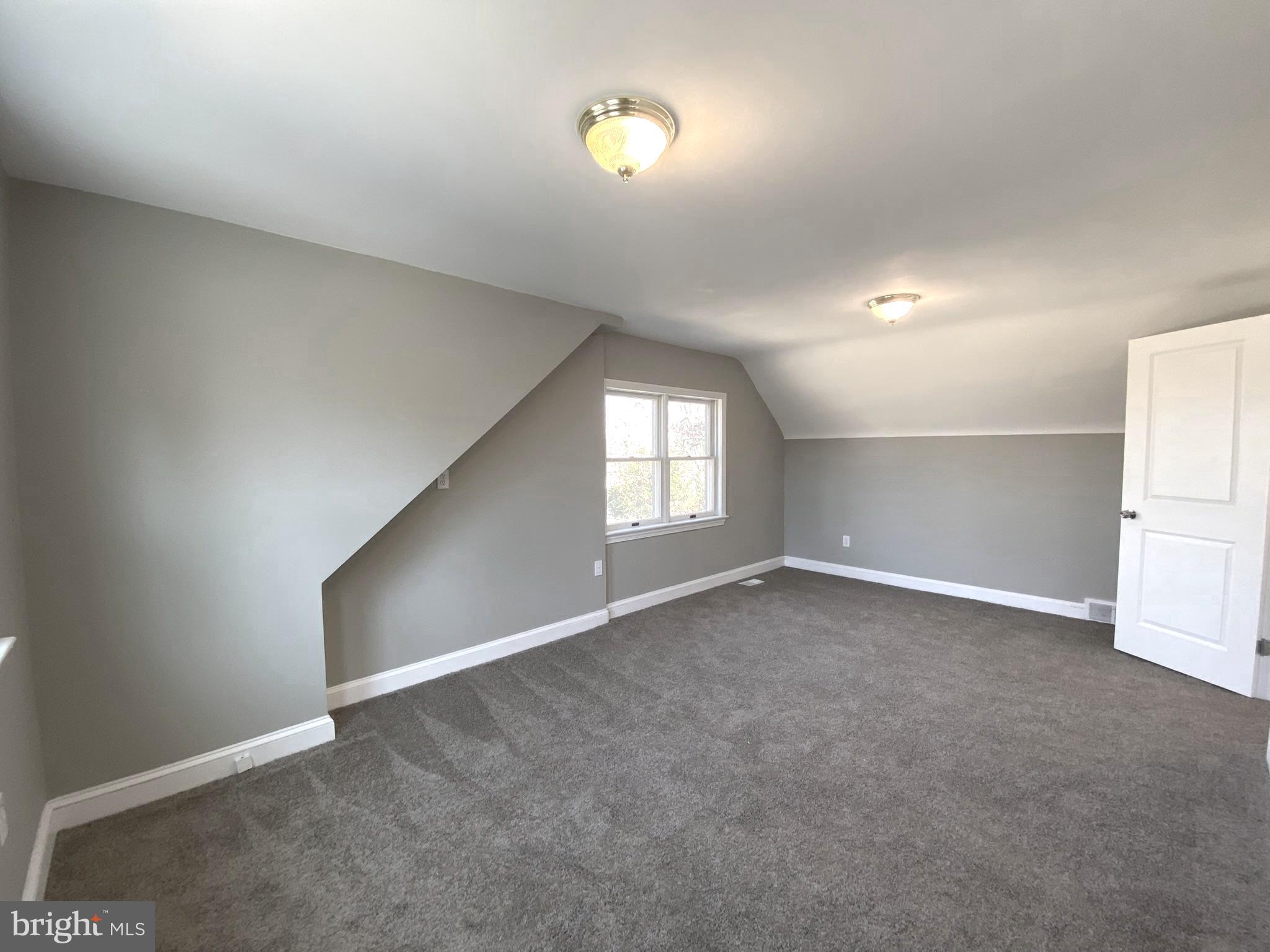 19 Woodhill Road Willow Grove, PA 19090 - Photo 14 of 24 an empty room with windows and closet