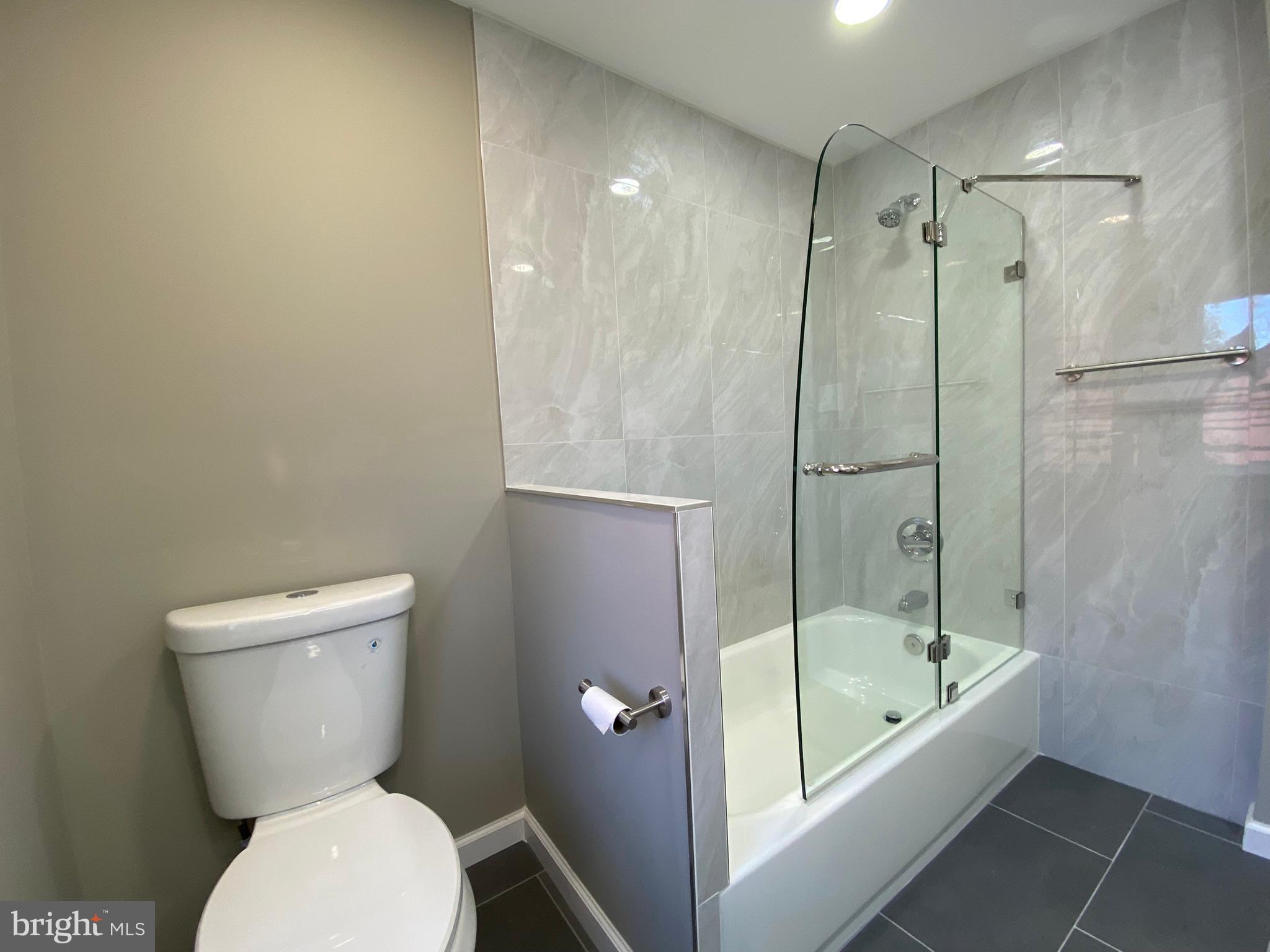 19 Woodhill Road Willow Grove, PA 19090 - Photo 17 of 24 a bathroom with a toilet and a shower