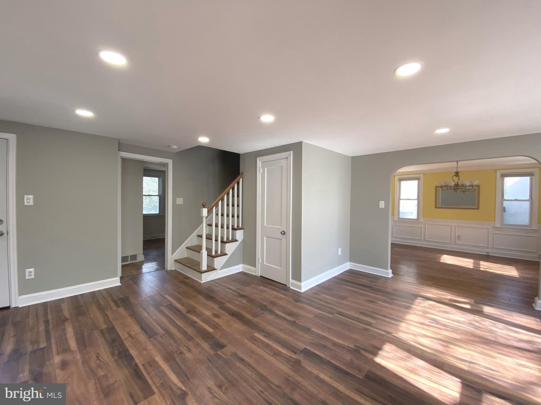 19 Woodhill Road Willow Grove, PA 19090 - Photo 3 of 24 a view of an empty room with wooden floor and windows