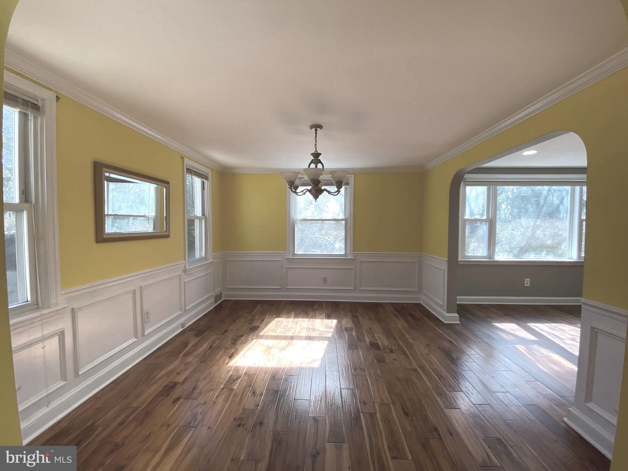 19 Woodhill Road Willow Grove, PA 19090 - Photo 9 of 24 a view of an empty room with wooden floor and a window