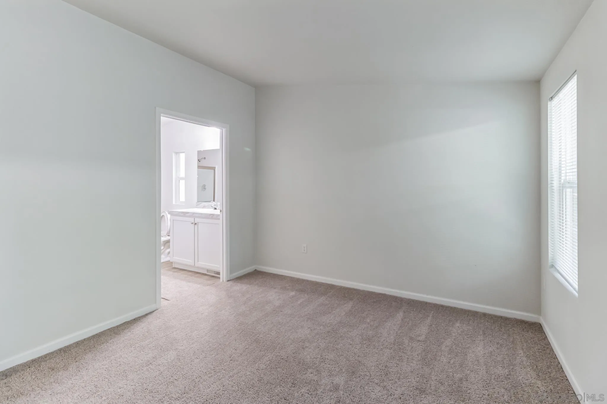 22899 Byron Road, Unit 35 Crestline, CA 92325 - Photo 13 of 18 an empty room with windows
