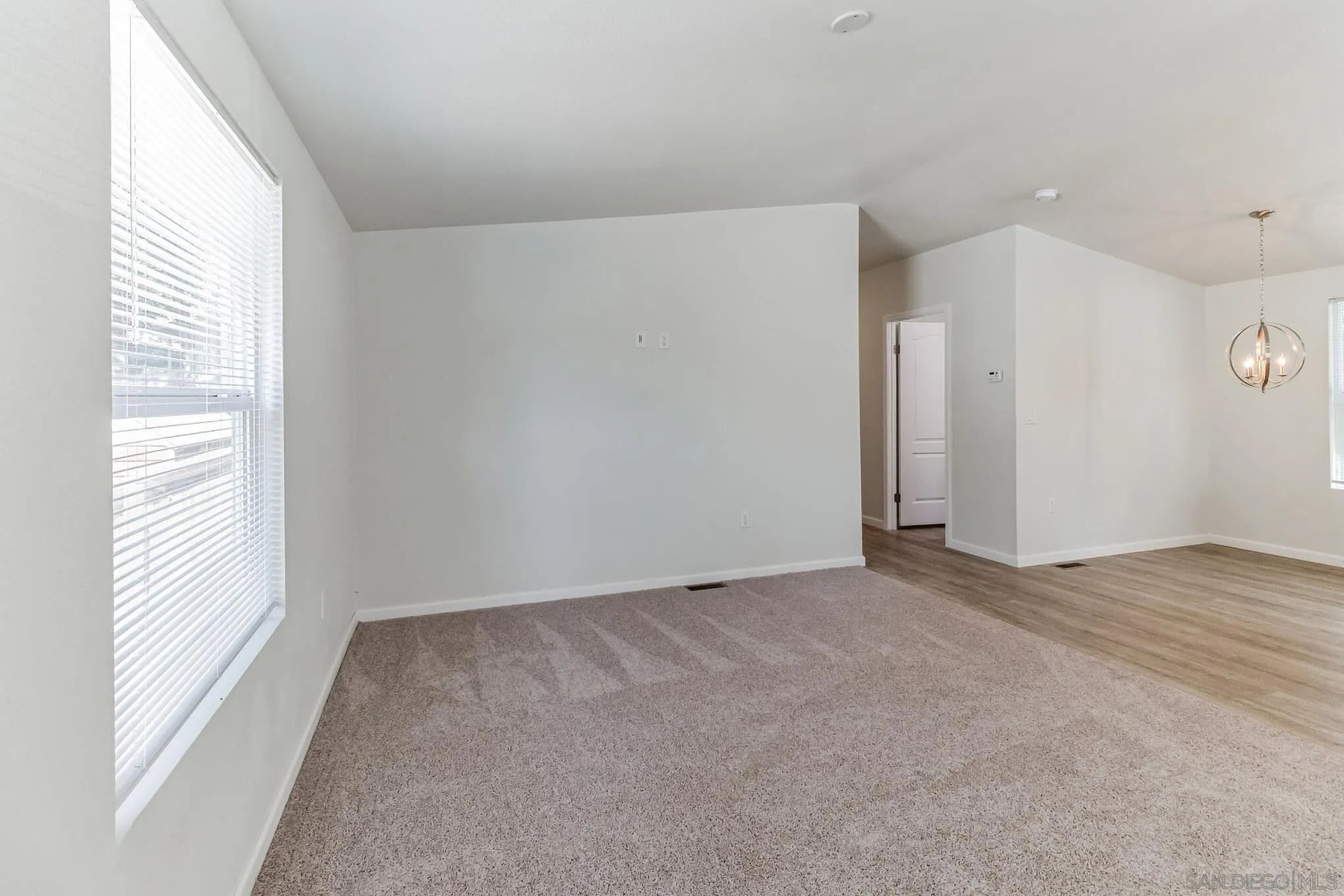 22899 Byron Road, Unit 35 Crestline, CA 92325 - Photo 18 of 18 a view of an empty room with a window