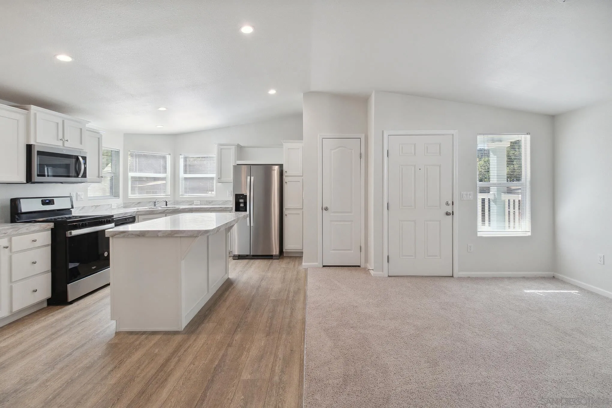 22899 Byron Road, Unit 35 Crestline, CA 92325 - Photo 5 of 18 a large kitchen with cabinets and stainless steel appliances