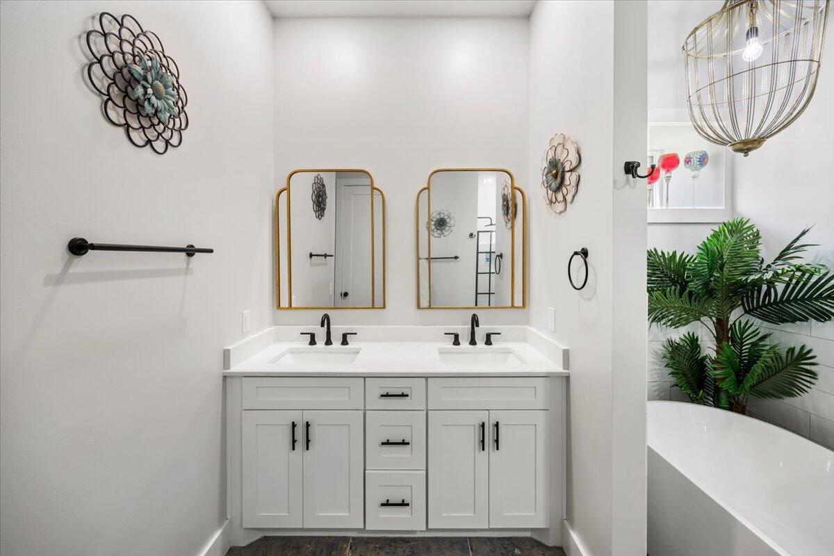 3574 Bob Tolbert Road Navarre, FL 32566 - Photo 33 of 67 a bathroom with a sink and a mirror