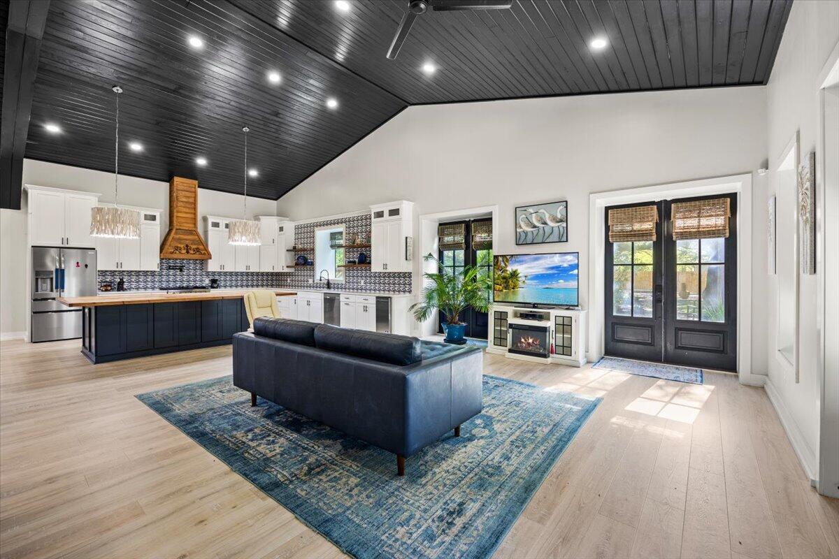 3574 Bob Tolbert Road Navarre, FL 32566 - Photo 5 of 67 a living room with furniture and a flat screen tv
