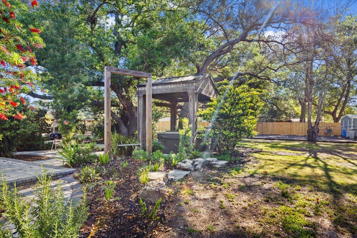 3574 Bob Tolbert Road Navarre, FL 32566 - Photo 53 of 67 a view of house with trees in the background