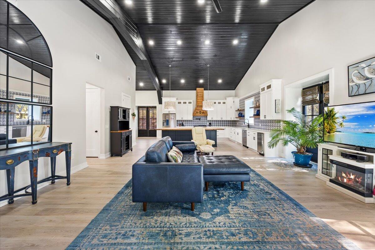 3574 Bob Tolbert Road Navarre, FL 32566 - Photo 6 of 67 a living room with furniture and a potted plant