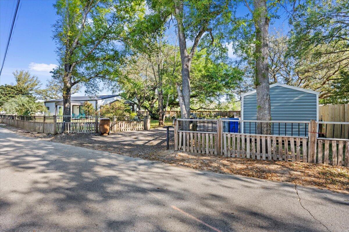 3574 Bob Tolbert Road Navarre, FL 32566 - Photo 67 of 67 a view of street along with trees