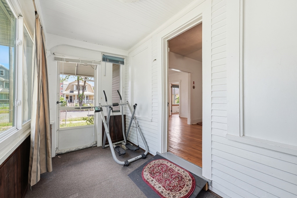 136 Maynard Street Springfield, MA 01109 - Photo 29 of 35 a view of a entryway door with wooden floor