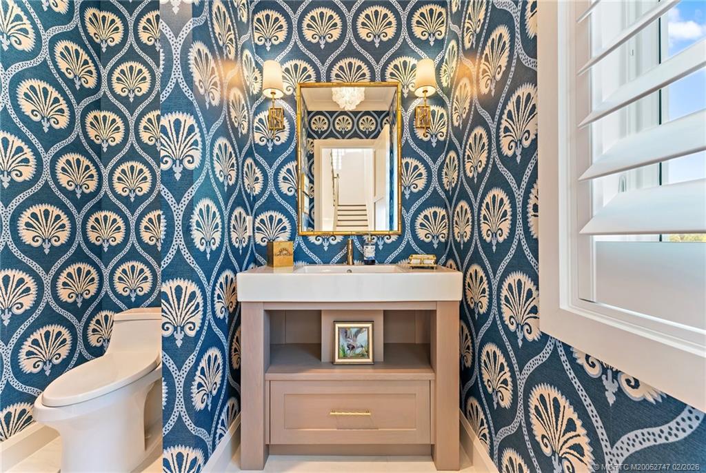 4824 Watersong Way Fort Pierce, FL 34949 - Photo 26 of 65 a front view of a house with a front door