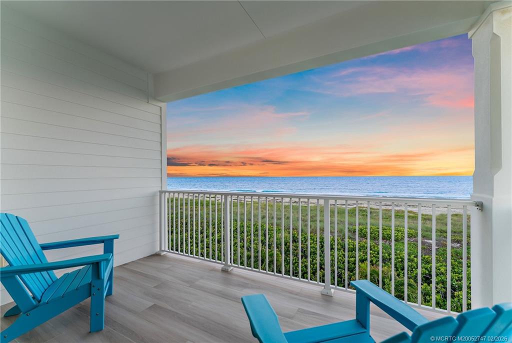 4824 Watersong Way Fort Pierce, FL 34949 - Photo 36 of 65 a view of a chair and table in the balcony