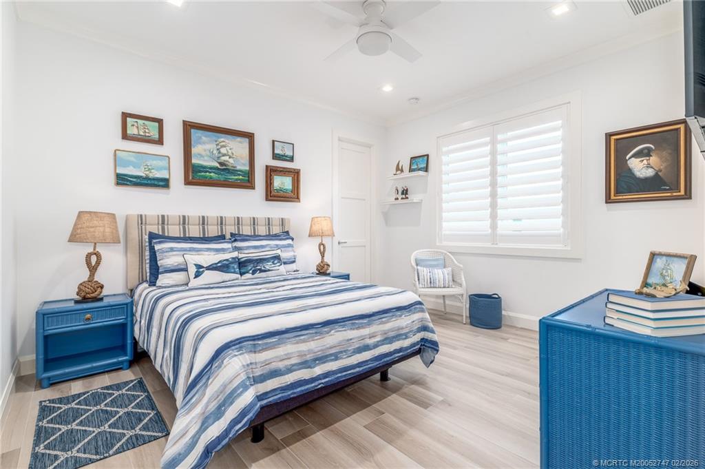 4824 Watersong Way Fort Pierce, FL 34949 - Photo 41 of 65 a bedroom with bed and a window