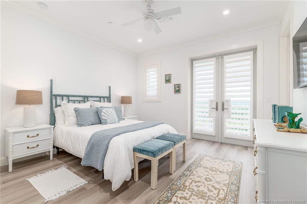 4824 Watersong Way Fort Pierce, FL 34949 - Photo 43 of 65 a bed room with a bed and a tv