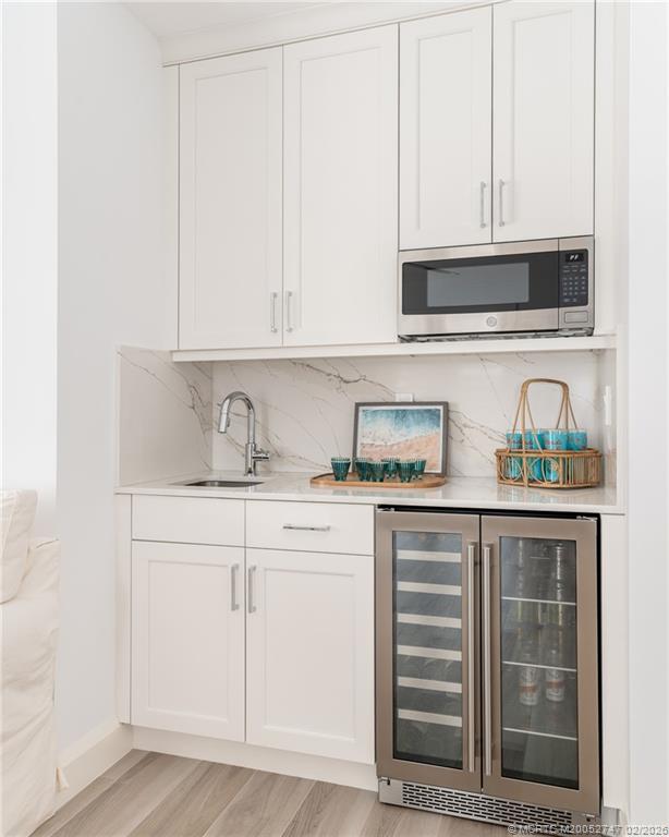 4824 Watersong Way Fort Pierce, FL 34949 - Photo 52 of 65 First floor bar/snack area