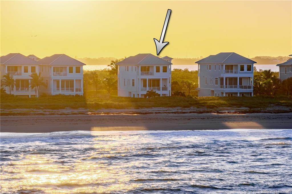 4824 Watersong Way Fort Pierce, FL 34949 - Photo 59 of 65 a front view of a house with a ocean view