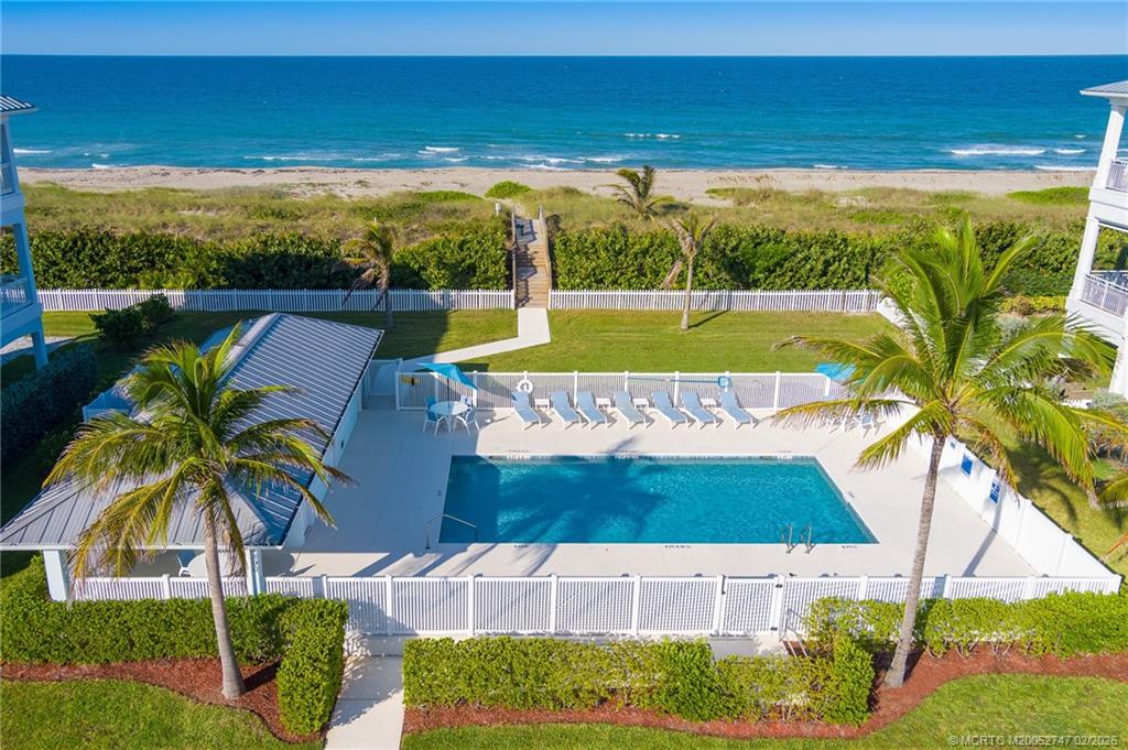 4824 Watersong Way Fort Pierce, FL 34949 - Photo 61 of 65 a view of an ocean and beach