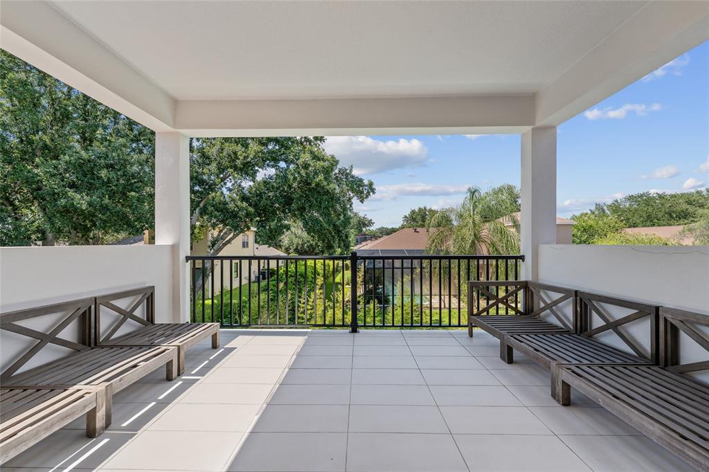 10175 Brocksport Circle Gotha, FL 34734 - Photo 48 of 54 a view of a balcony with chairs