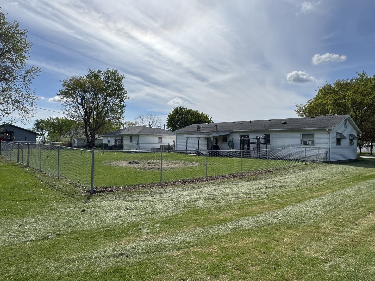 419 East Cleveland Street Cullom, IL 60929 - Photo 14 of 14 a view of pool with a big yard and a large trees