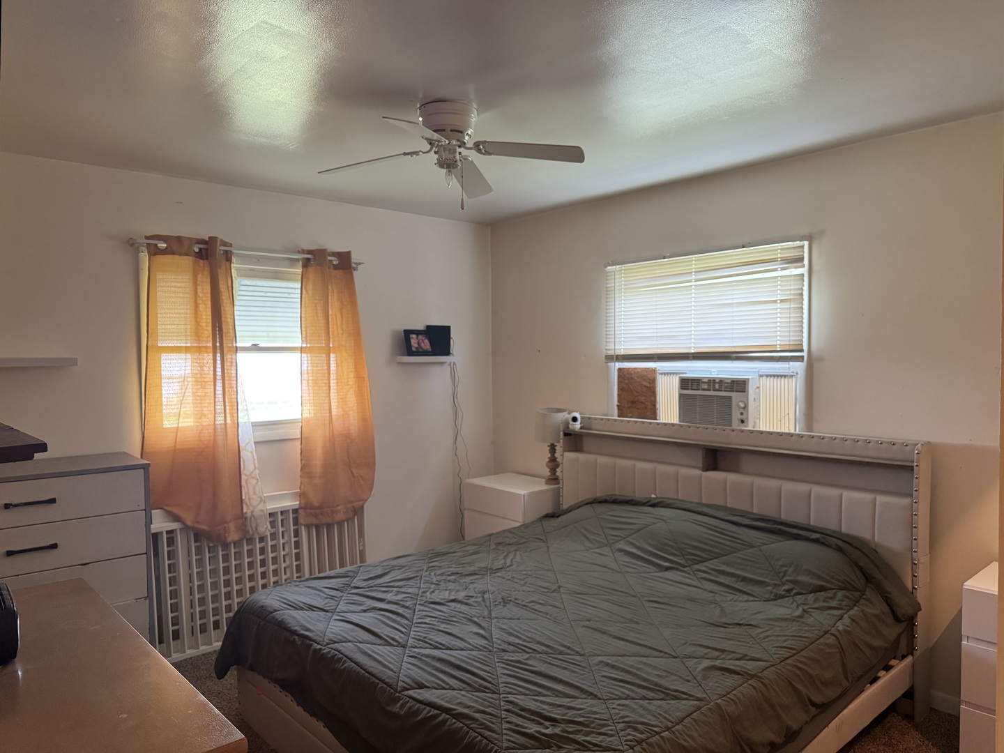 419 East Cleveland Street Cullom, IL 60929 - Photo 10 of 14 a bedroom with a bed and window