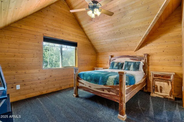 a view of a balcony with wooden floor and outdoor space