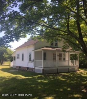 a front view of house with yard