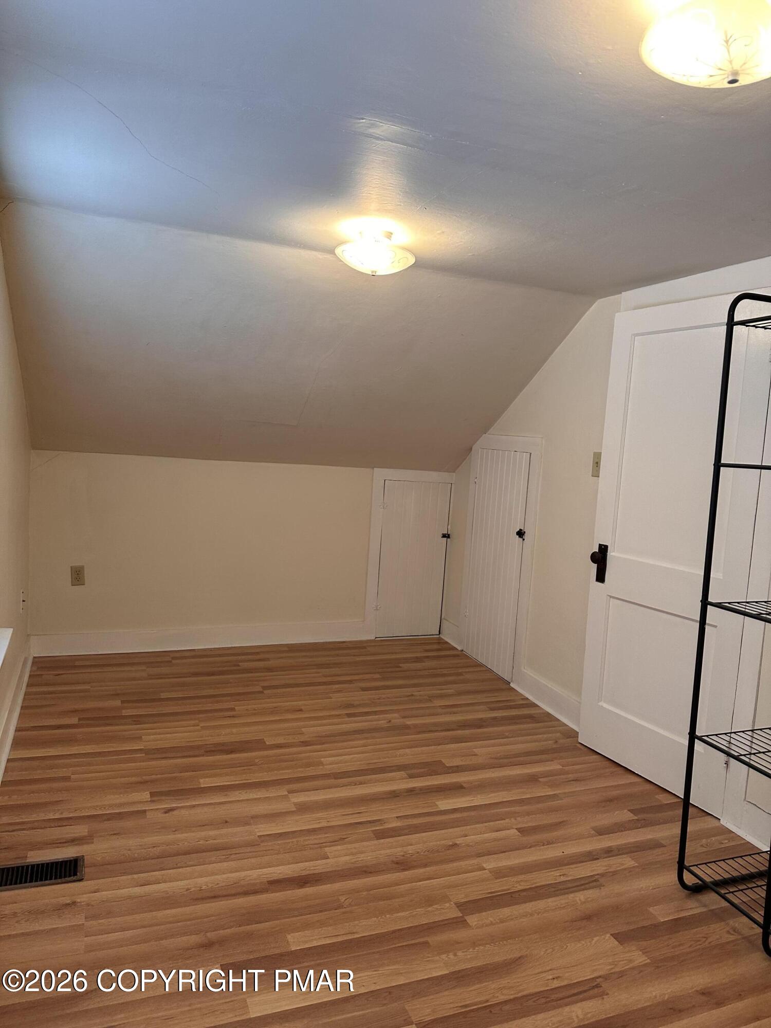 142 Craigs Meadow Road East Stroudsburg, PA 18301 - Photo 19 of 23 a view of empty room with wooden floor
