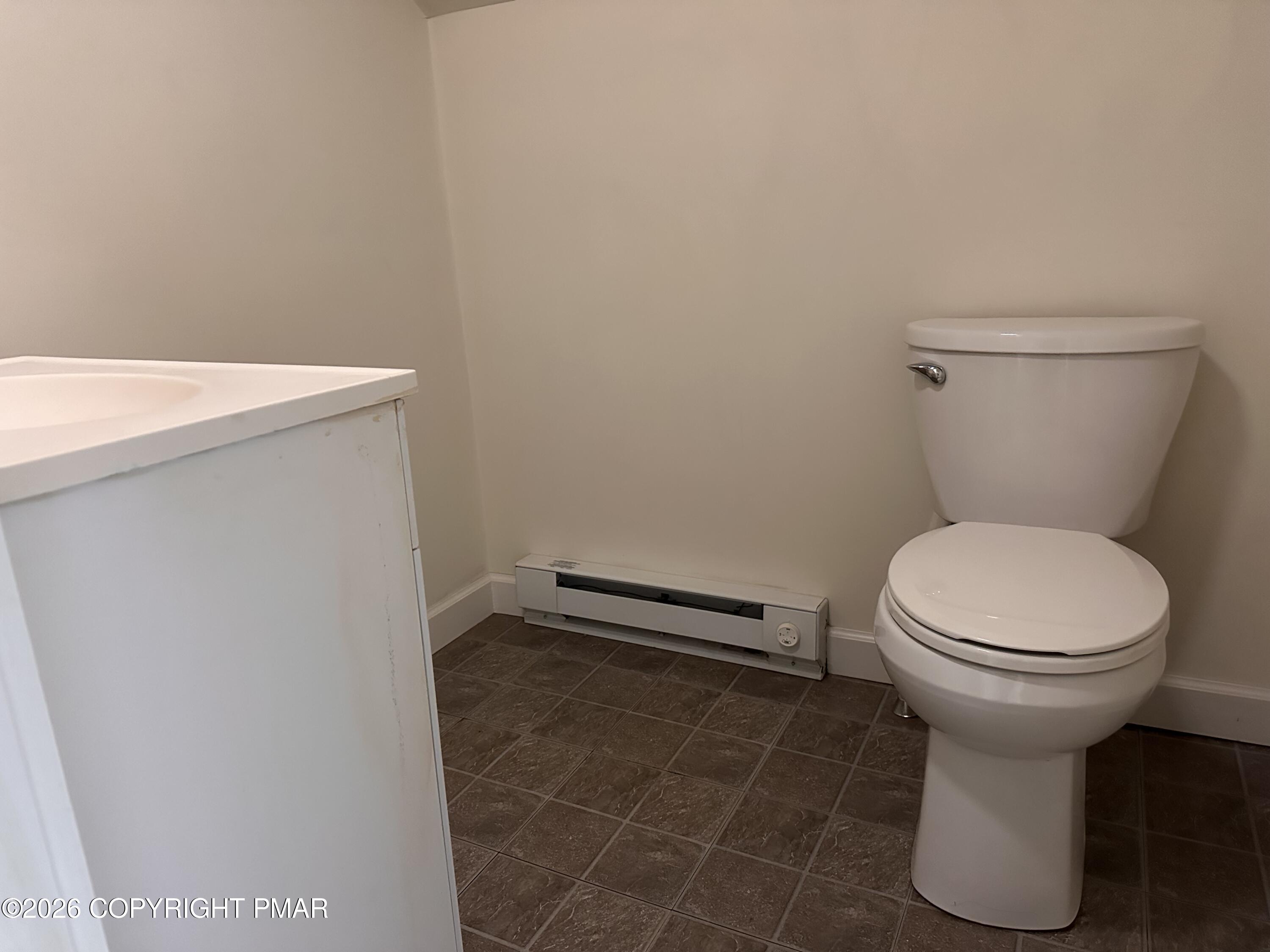 142 Craigs Meadow Road East Stroudsburg, PA 18301 - Photo 20 of 23 a bathroom with a sink and a toilet