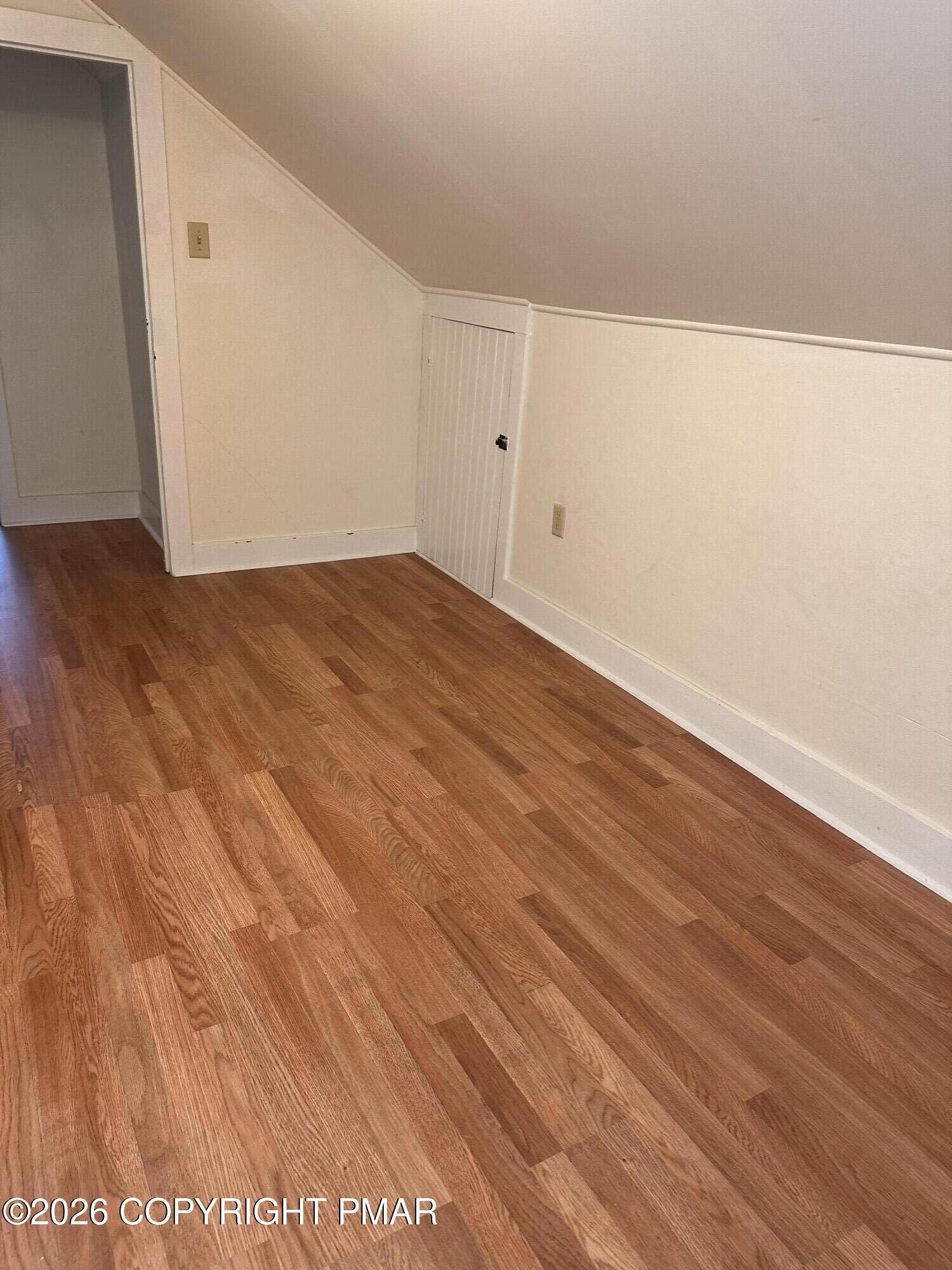 142 Craigs Meadow Road East Stroudsburg, PA 18301 - Photo 22 of 23 an empty room with wooden floor