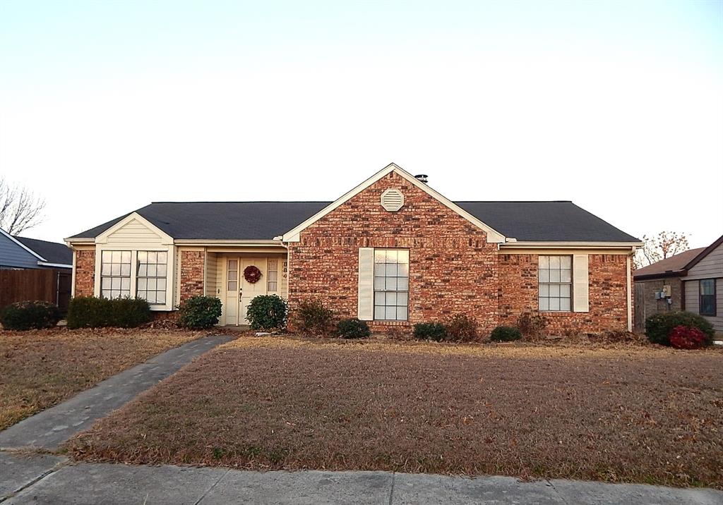 884 Bitternut Drive Coppell, TX 75019 - Photo 1 of 1 a front view of a house with a yard