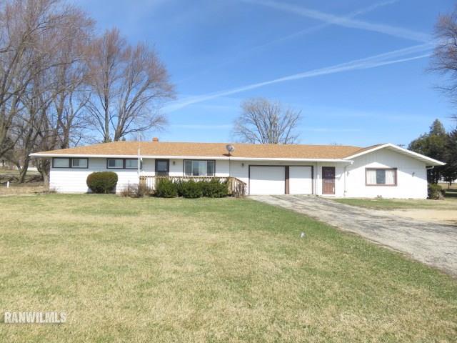 692 West Fairgrounds Road Freeport, IL 61032 - Photo 1 of 1 a front view of a house with a yard