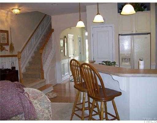 2324 Putters Way Raleigh, NC 27614 - Photo 5 of 8 Beautiful arched doorways, hardwoods and upgraded lighting.