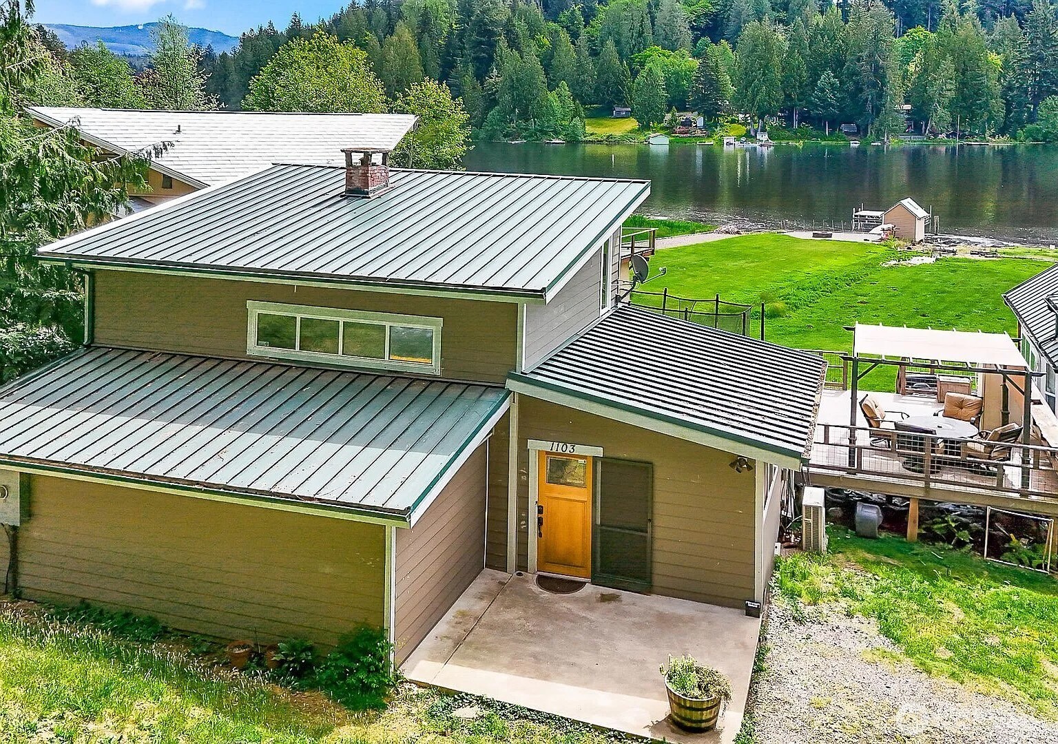 1103 Southwest Roesiger Road Snohomish, WA 98290 - Photo 1 of 32 a view of a house with a yard