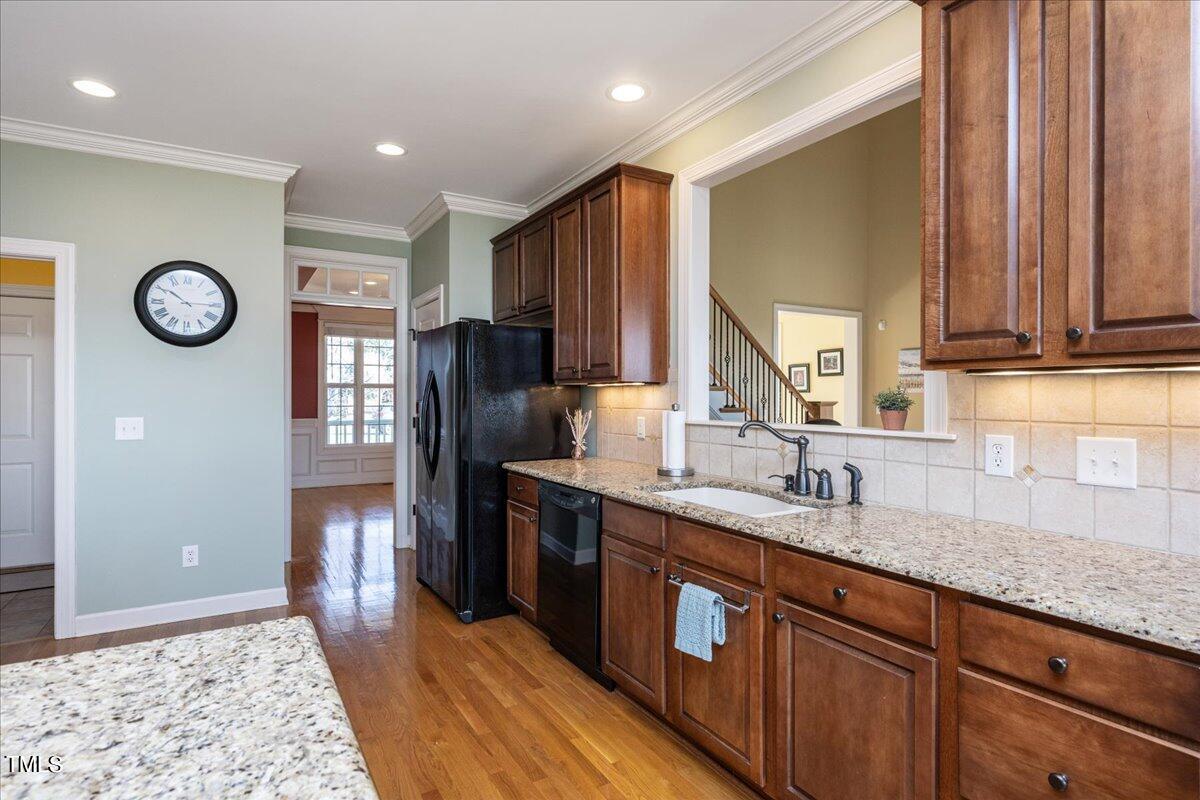 2117 Conroy Way Willow Spring, NC 27592 - Photo 13 of 38 Lovely open kitchen with a pass-through window to the living room