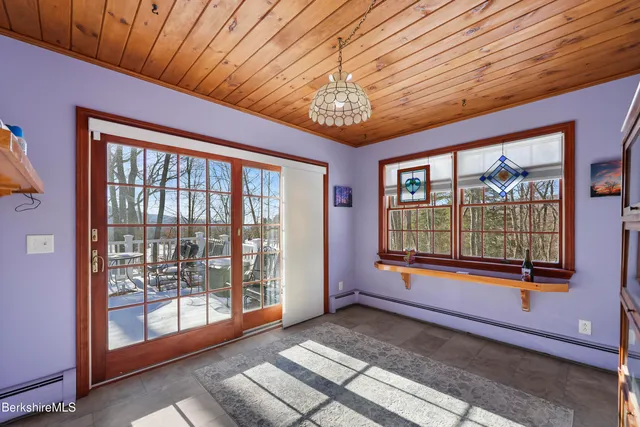 a view of an empty room with a balcony