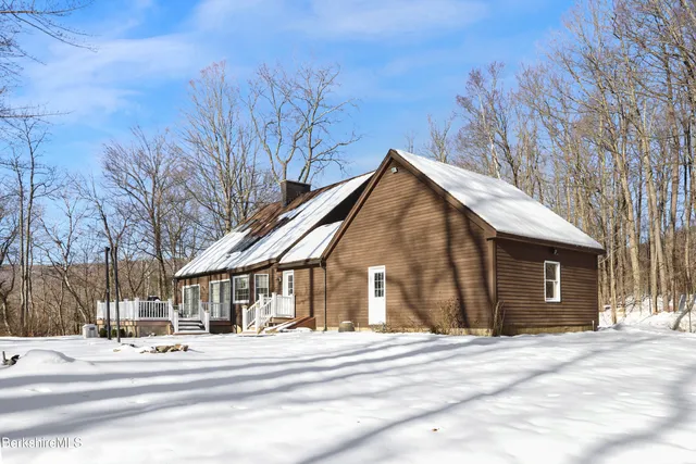 a view of road with a house