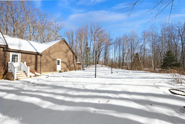 a view of street with large trees