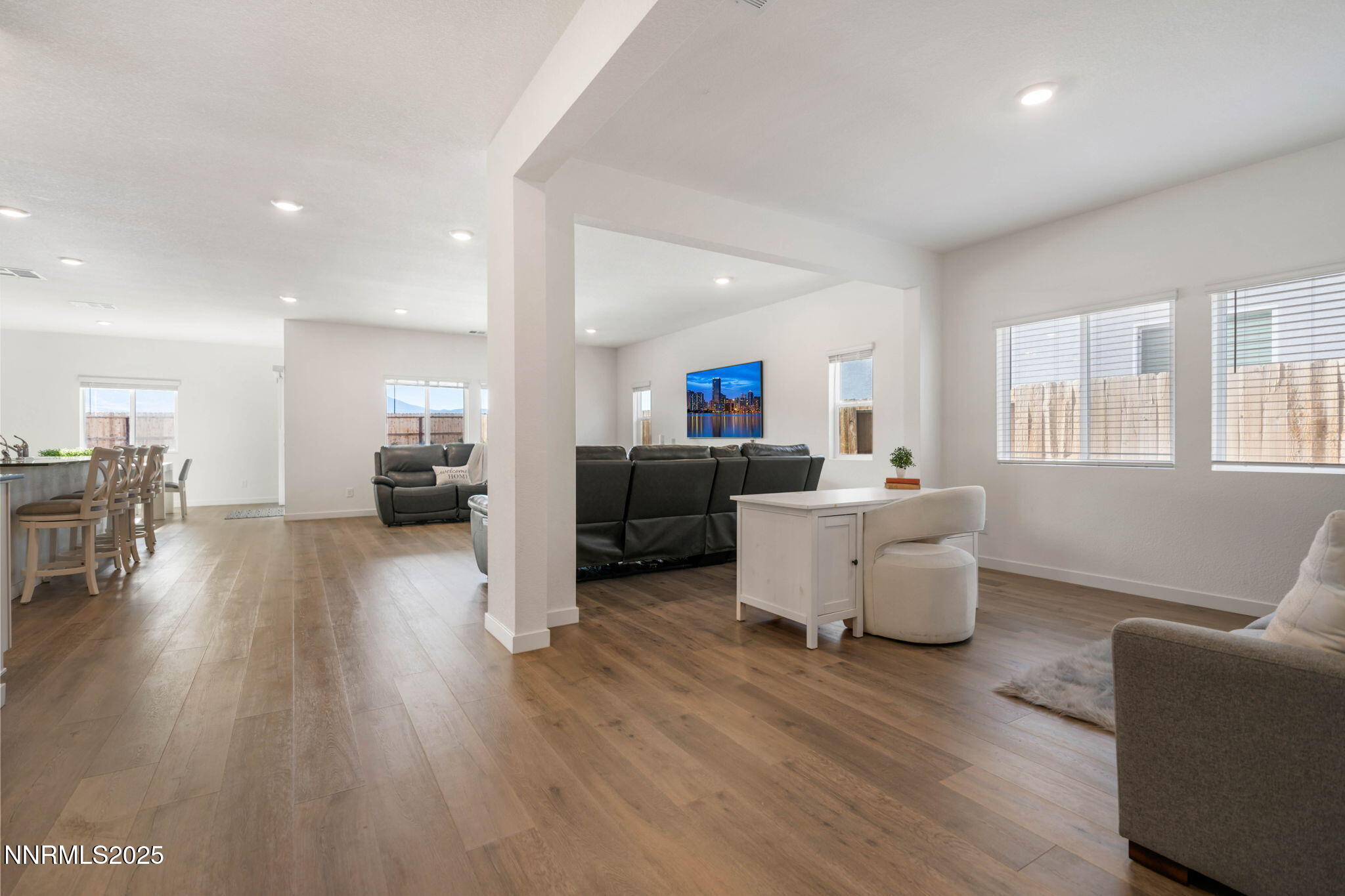 707 Butte Crk Road Dayton, NV 89403 - Photo 11 of 50 a living room with furniture and a wooden floor