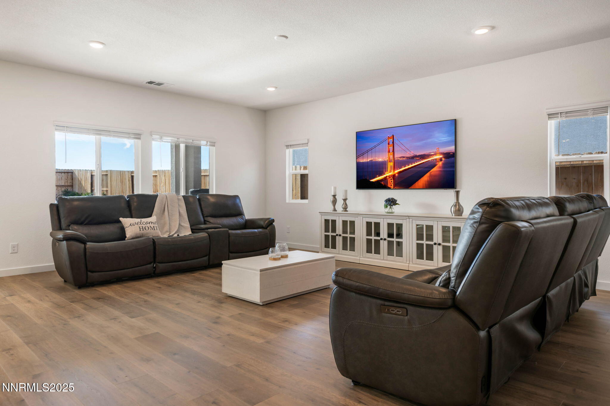 707 Butte Crk Road Dayton, NV 89403 - Photo 12 of 50 a living room with furniture and a flat screen tv