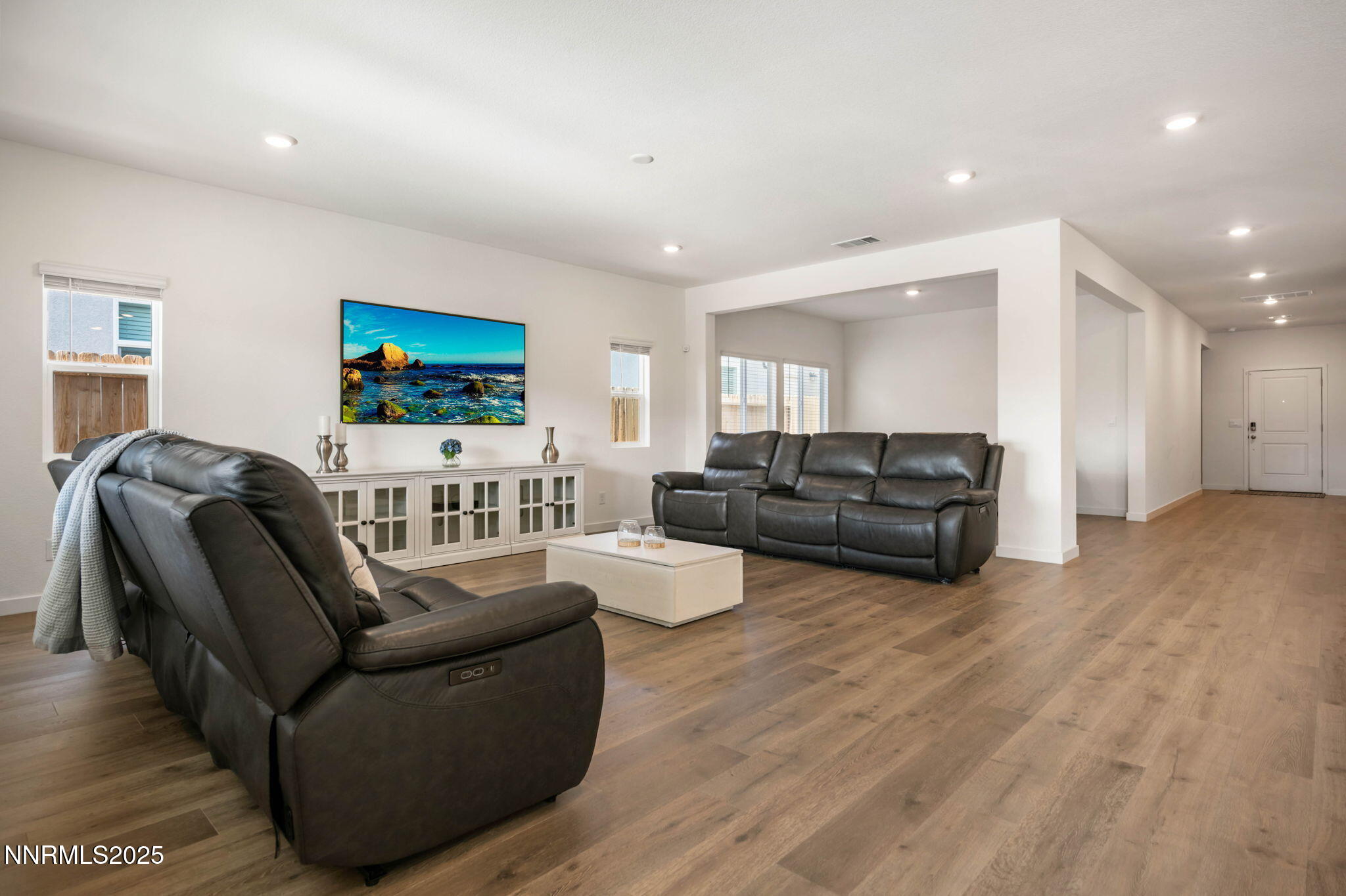 707 Butte Crk Road Dayton, NV 89403 - Photo 14 of 50 a living room with furniture and a flat screen tv