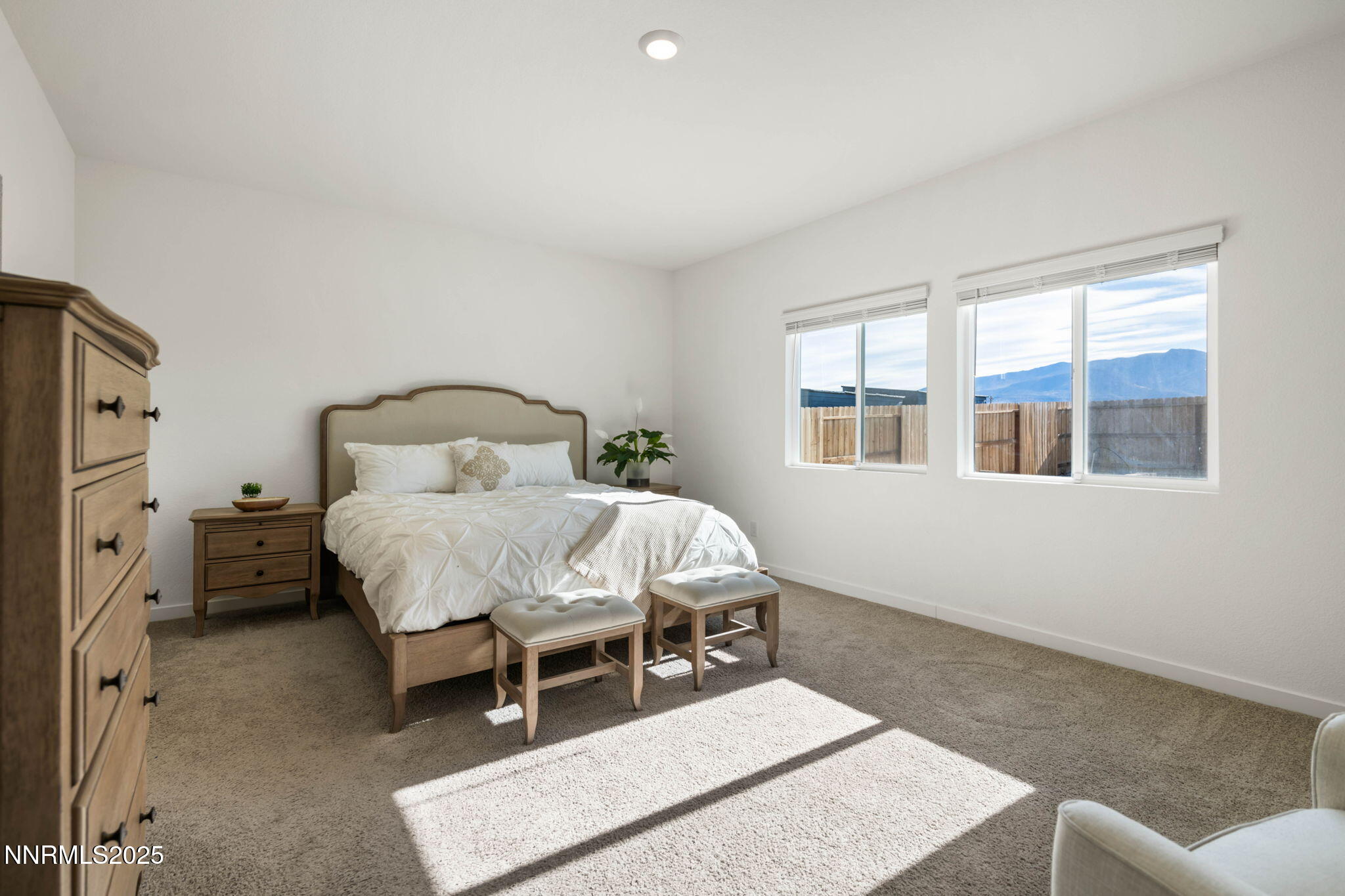 707 Butte Crk Road Dayton, NV 89403 - Photo 24 of 50 a bedroom with a bed and wooden floor