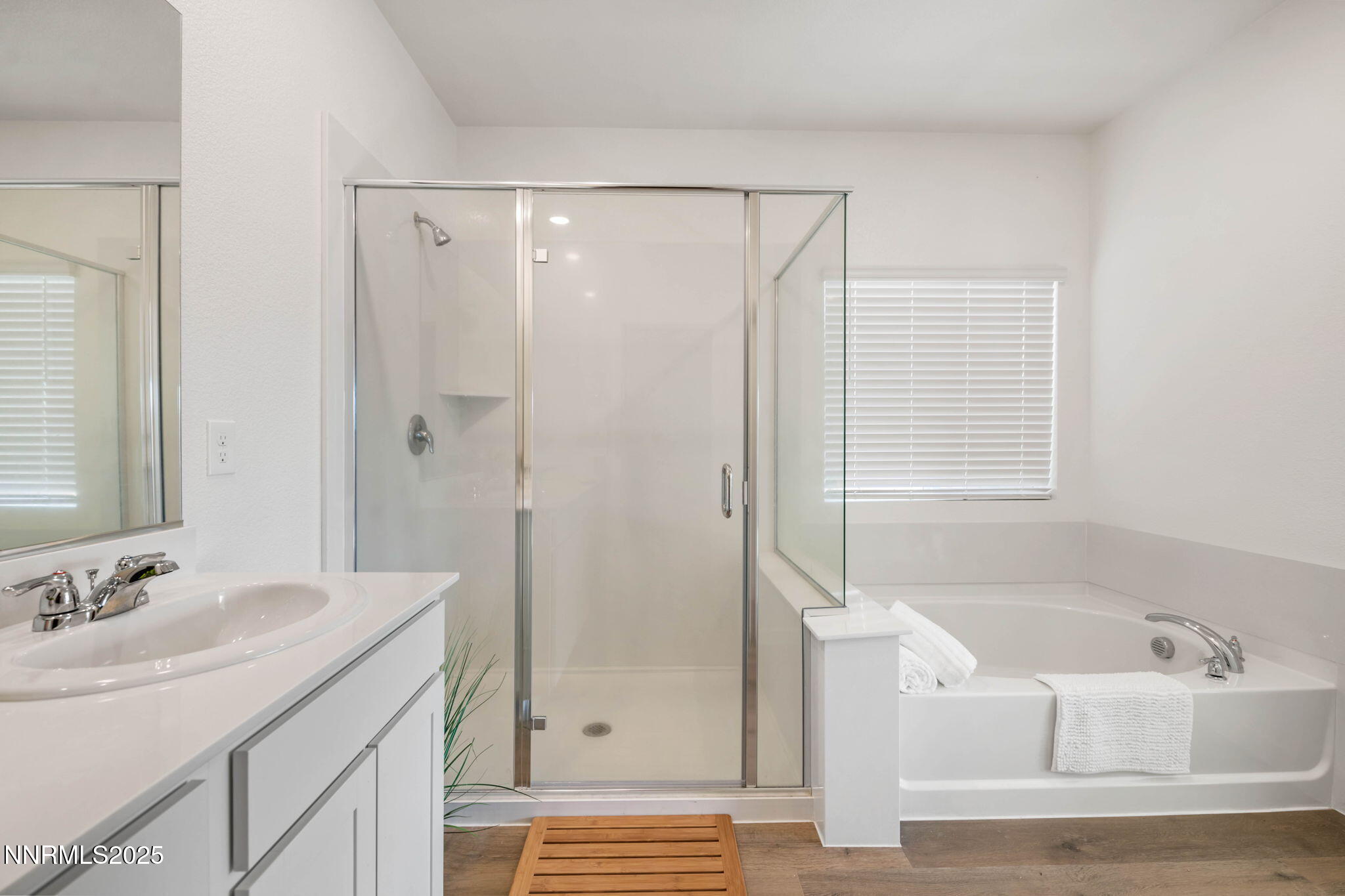 707 Butte Crk Road Dayton, NV 89403 - Photo 28 of 50 a bathroom with a granite countertop sink a shower and a mirror