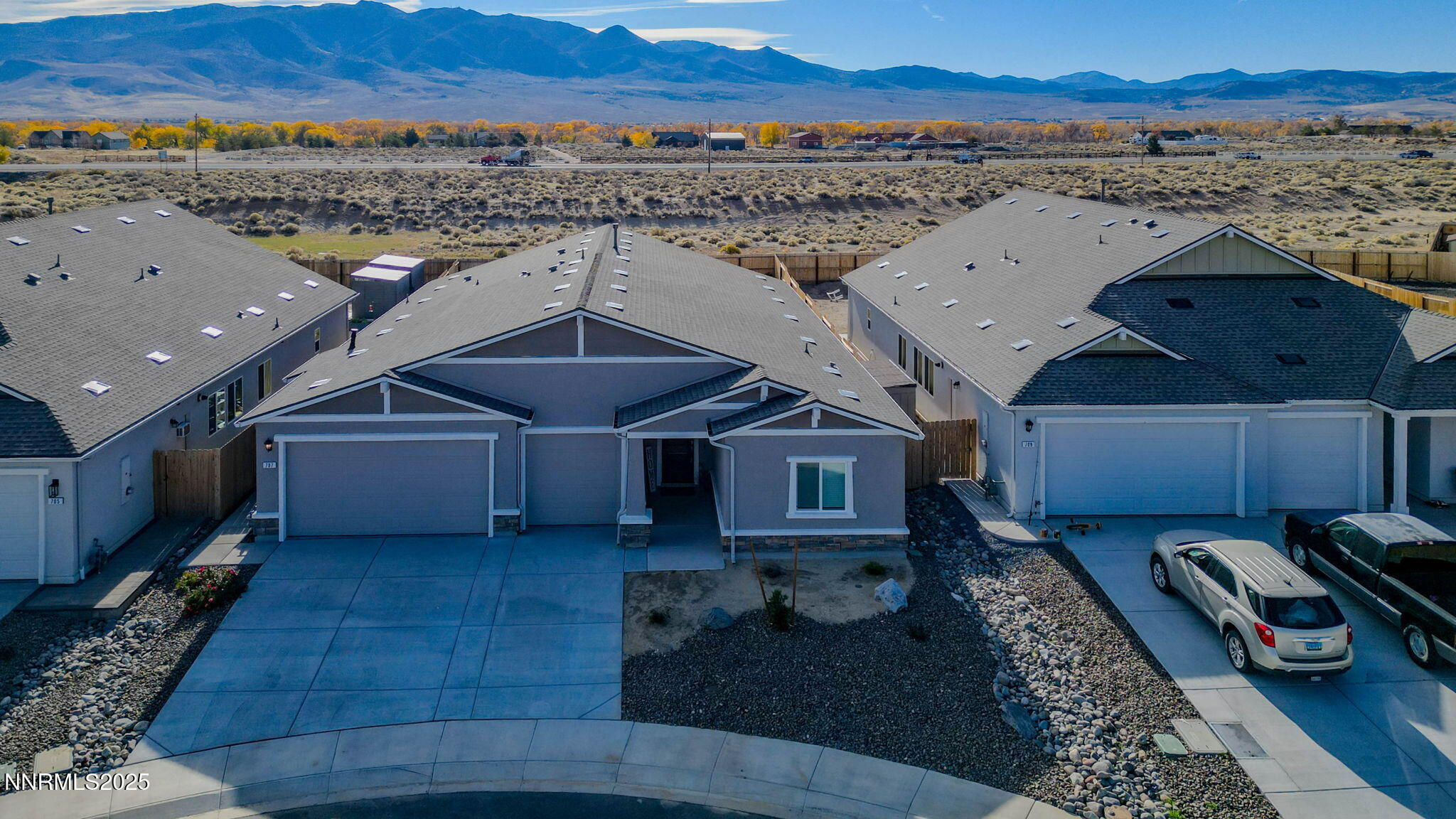 707 Butte Crk Road Dayton, NV 89403 - Photo 8 of 50 an aerial view of a house with a yard wooden table and chairs