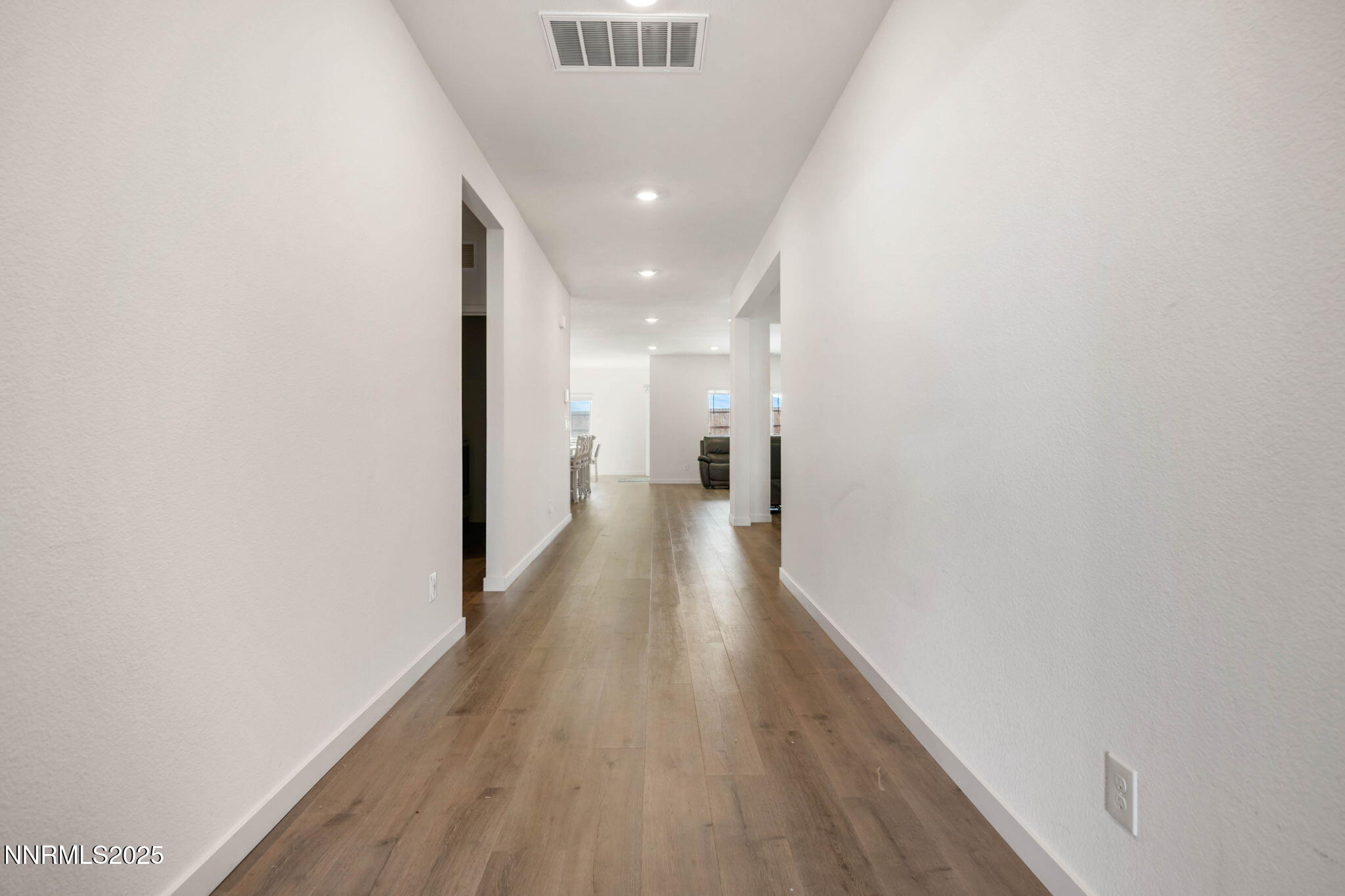 707 Butte Crk Road Dayton, NV 89403 - Photo 10 of 50 a view of a hallway with wooden floor